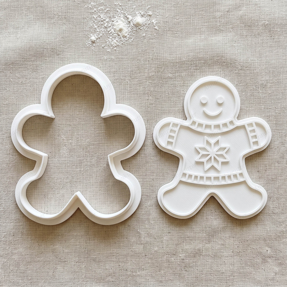 Tagliabiscotti e timbro bianchi a forma di omino pan di zenzero con maglione decorato da un fiocco di neve